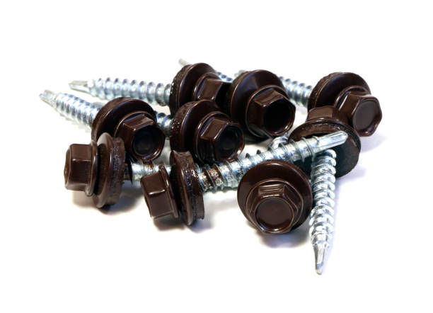 istock Screws for fixing the roof isolated on white background. Metal fasteners. 1308939607