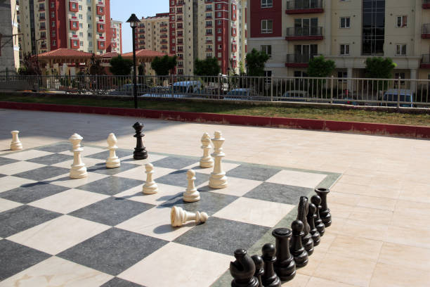Close up big outdoor chess set in public park.
