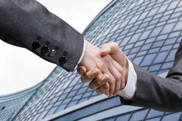 istock Handshake of two businessmen . 1308948442