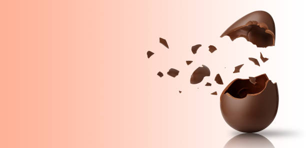 istock Easter egg exploded with many pieces of chocolate suspended in the air 1308949012