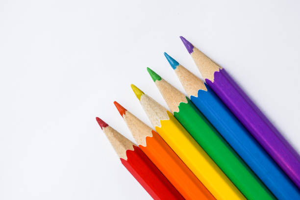 istock Colored Rainbow Pencils school supplies on white background. 1308949879