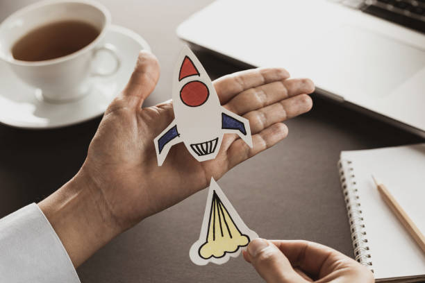 istock Business Person with Startup Rocket 1308950454