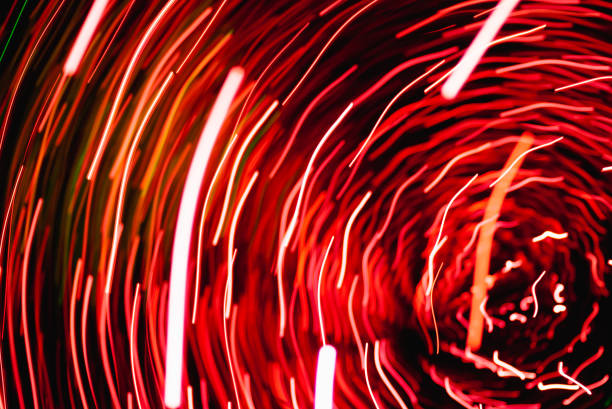 istock Blurred defocused Lights fly in a circle, light red circles 1308951924