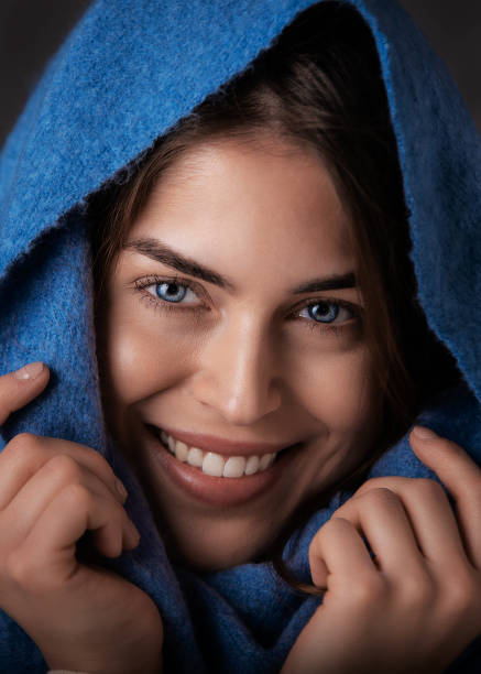 young beautiful happy girl wearing blur scarf on her head - girl5 imagens e fotografias de stock