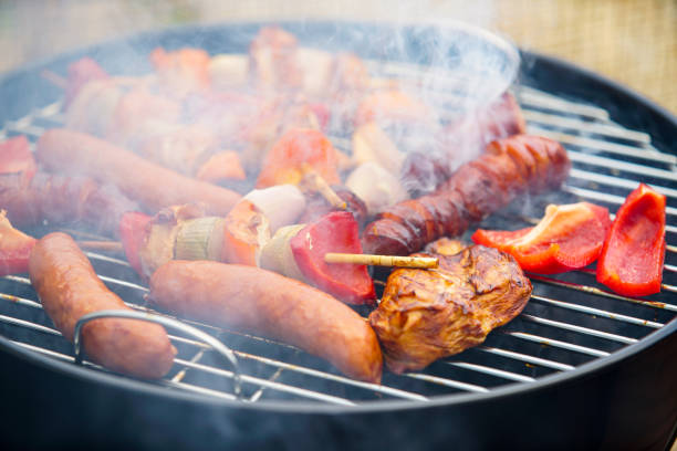 istock Meat and sausages on a grill 1308953234