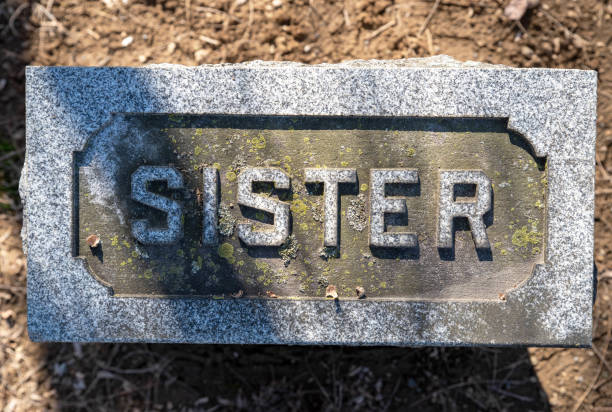 istock SISTER old cemetery grave stone 1308953419