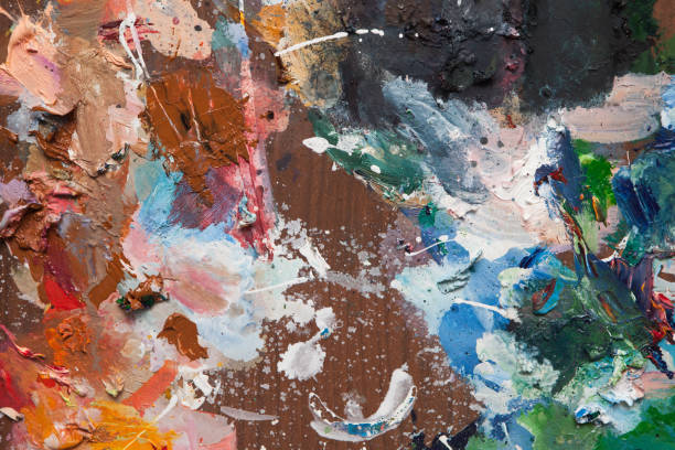 istock Background image of bright oil paint palette 1308954088