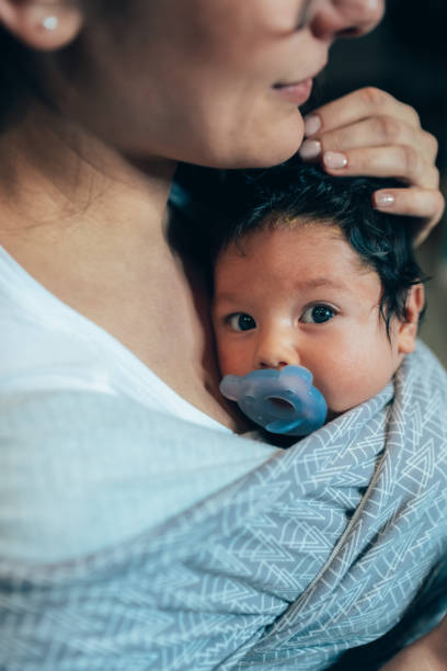 istock Baby is always close to mom 1308954564
