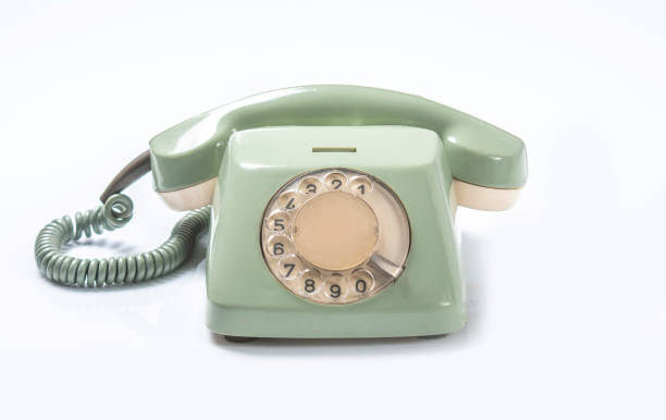 istock Vintage Telephone on White Board 1308955384