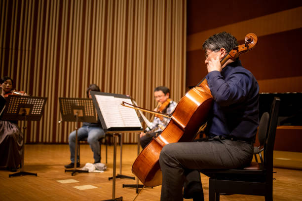 istock Musicians playing violin, viola and cello at classical music concert 1308959164