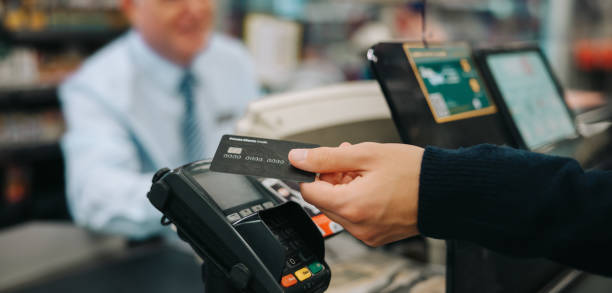 istock Contactless payment at supermarket 1308959579