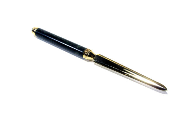 istock A metallic office knife on a white background. 1308961087