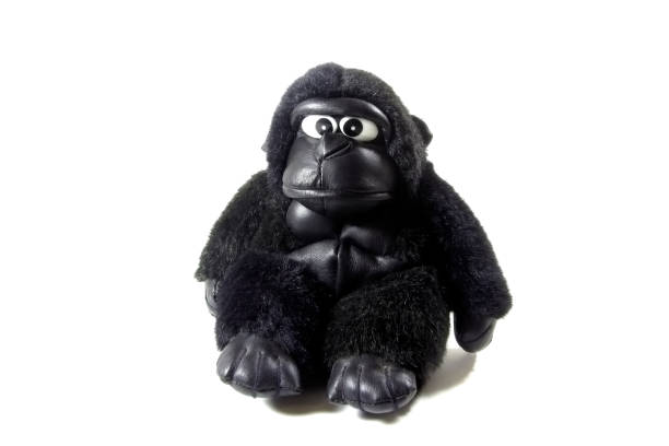 Toy Gorilla isolated on a white background. Monkey clouse-up.