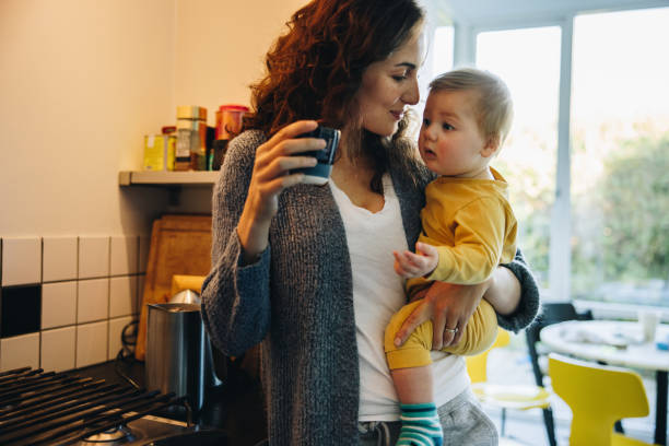 istock Mother and baby at home 1308963480