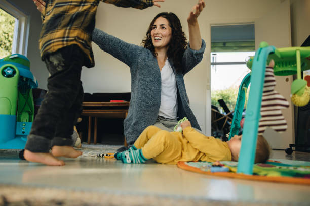 istock Mom with her two kids 1308963680