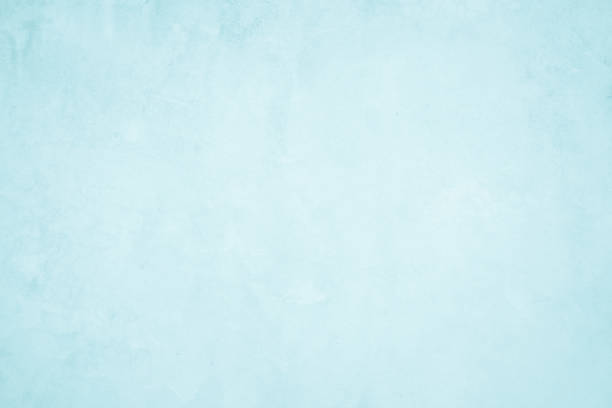 istock Pastel Blue and White concrete stone texture for background in summer wallpaper. Cement and sand wall of tone vintage. Concrete abstract wall of light cyan color, cement texture mint green for design. 1308965116