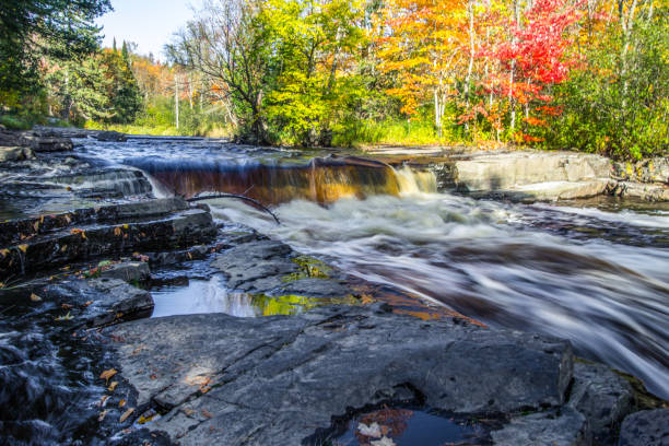 istock Beautiful Upper Peninsula Michigan Autumn Waterfall Landscape 1308966555