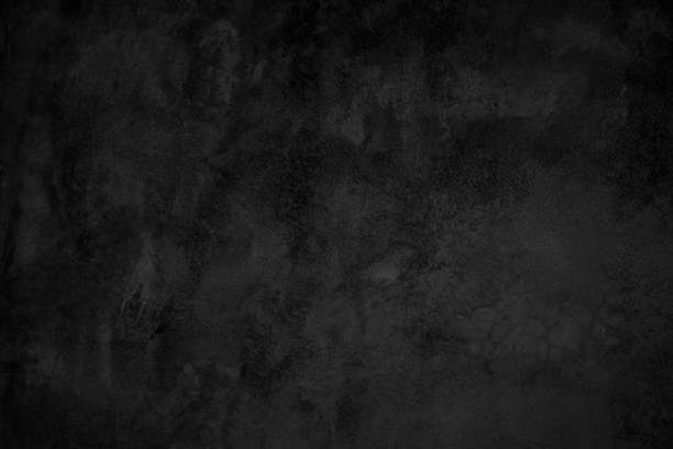 istock Close up retro plain dark black cement & concrete wall background texture for show or advertise or promote product and content on display and web design element concept decor. 1308966851