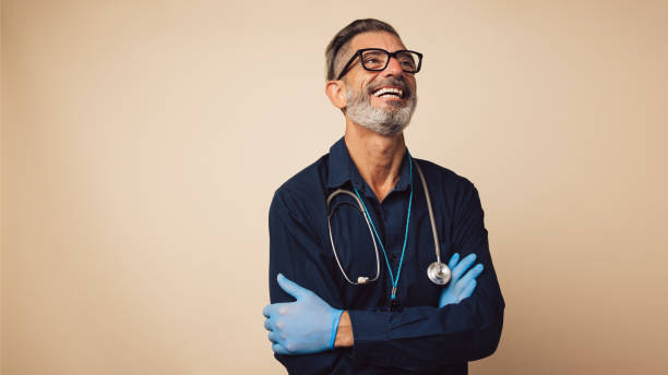 istock Happy looking male doctor 1308969108