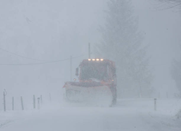 istock snow plow on country road 1308971668