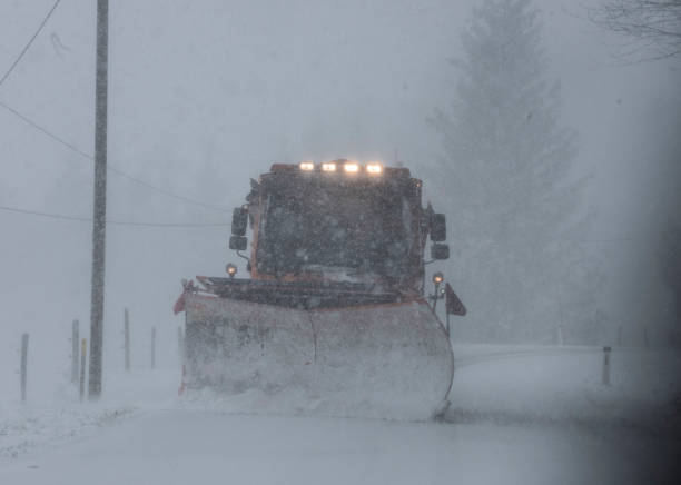 istock snow plow on country road 1308971694