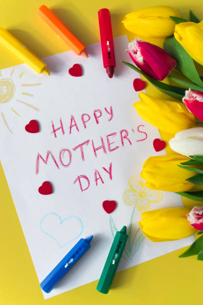 istock Mother`s Day card and tulips bouquet 1308971717