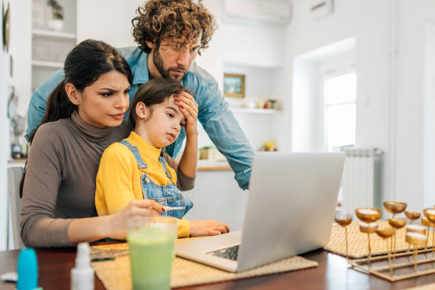 istock Parents communicating with a doctor 1308972353