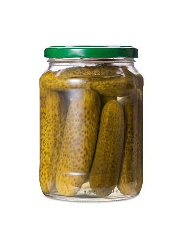 Jar of pickled gherkins isolated on white background. Side view.