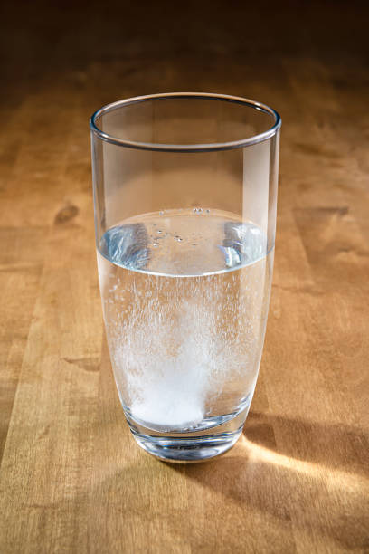 istock An antacid tablet that dissolves in a glass of water. 1308985828