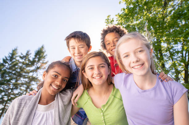 istock Happy and Smiling Multi Ethnic Group of Elementary School Children 1308986723