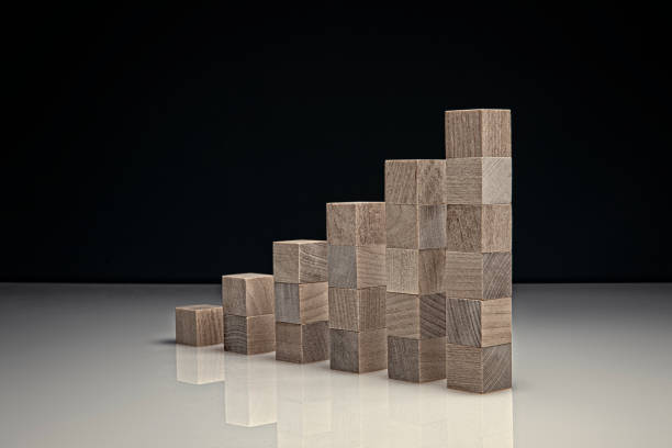 istock Angled Blocks on Black Background symbolizing Business Growth 1308989327
