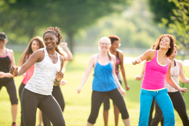 istock Diverse Group of Women Outdoors For Zumba Exercising Class 1308989760
