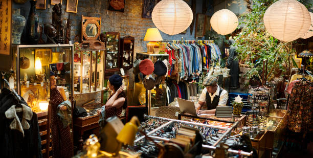 istock vintage shop owner and customer 1308991337