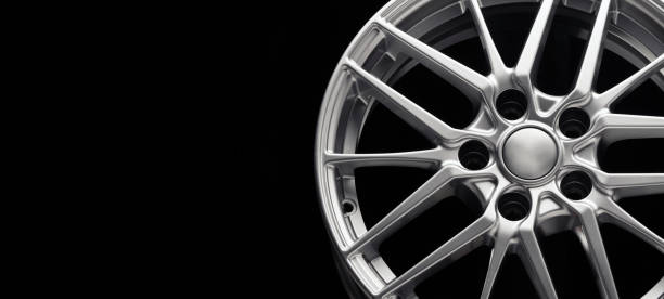 istock sport lightweight alloy wheel, spokes and rim front view, copy space 1308992896