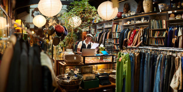 vintage shop owner vintage business owner lgbtqcollection stock pictures, royalty-free photos & images