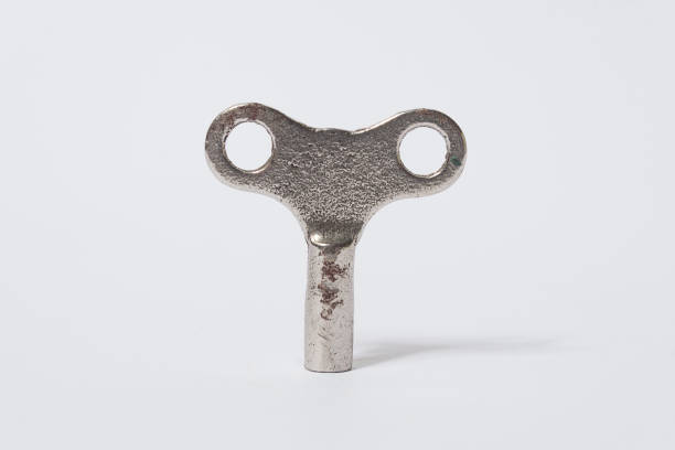 metal key on a white background - 3d illustration - rendering