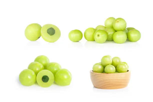 Fresh indian gooseberry isolated on white background, herb and medical fruit for health care concept