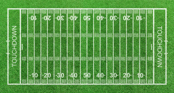 istock American football field, stripe grass with white pattern lines. Top view 1309006365