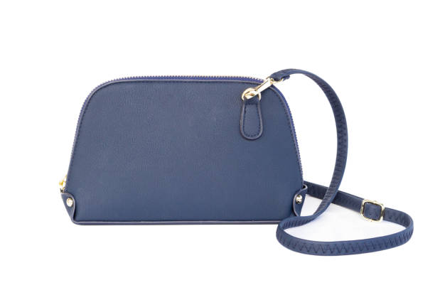 istock Closeup modern blue bag fashion on white background 1309007253