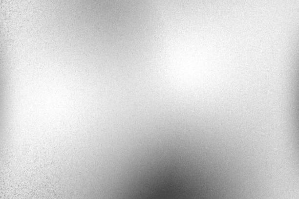 istock White silver foil glitter metallic wall with copy space, abstract texture background 1309011688