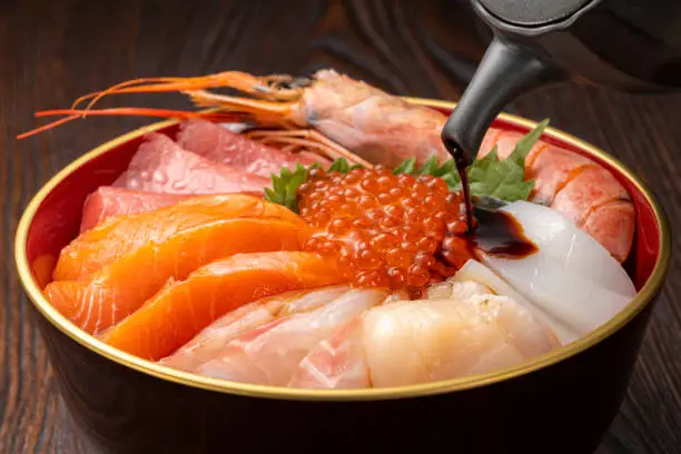 Fresh sashimi seafood bowl, Japanese food.