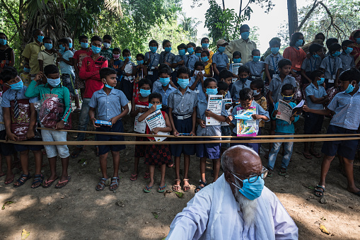 Nabinnagar, India – November 03, 2020: Life of students during lockdown due to coronavirus in India. At an aid-giving ceremony and free medical checkup.