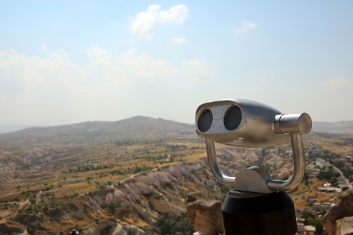 Viewing binoculars at observation tower.Travel and interesting places for sightseeing concept