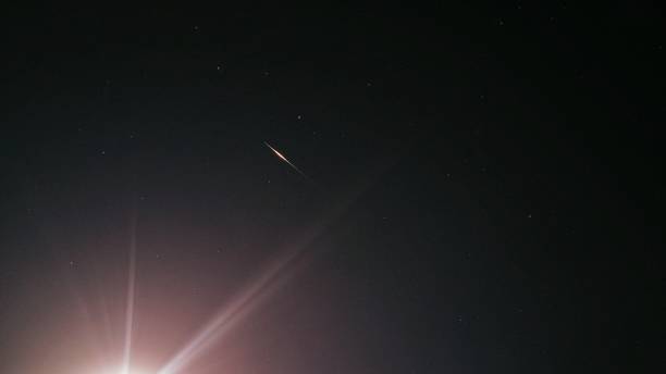 istock Iridium flare next to the Moon 1309016594