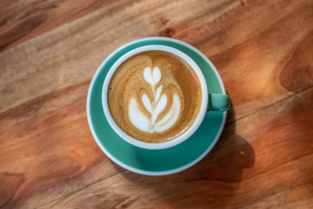 istock Hot latte coffee with latte art in a cup 1309017681