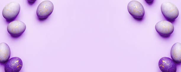 istock Easter frame of eggs painted in purple color. 1309019569