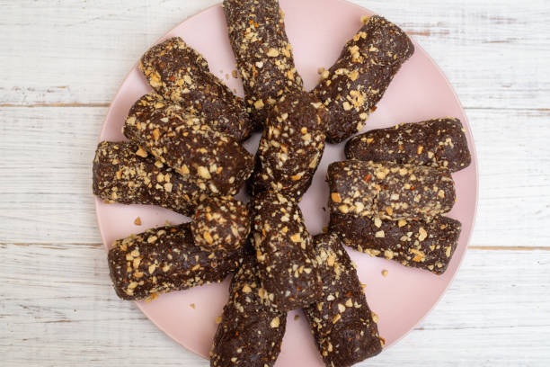 istock A cake made from grated biscuit cookies, cocoa and sugar. A quick dessert. Potato cake. 1309019683