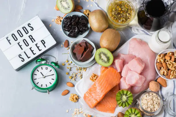 Foods rich in sleep promoting hormone melatonin and tryptophan to have before bed. Fatty fish, salmon, kiwi, nuts, oatmeal, milk, turkey, chicken, chamomile tea, prunes and tart cherry juice