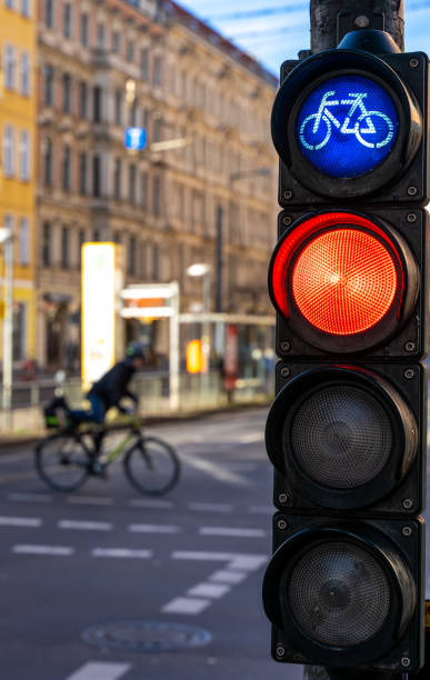 istock Bicycle Stop Light On Road Against Building In City 1309032686