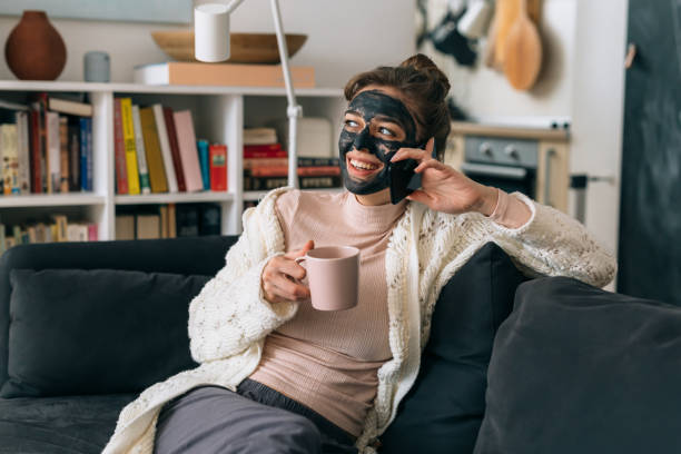 istock woman relaxing at home 1309034432